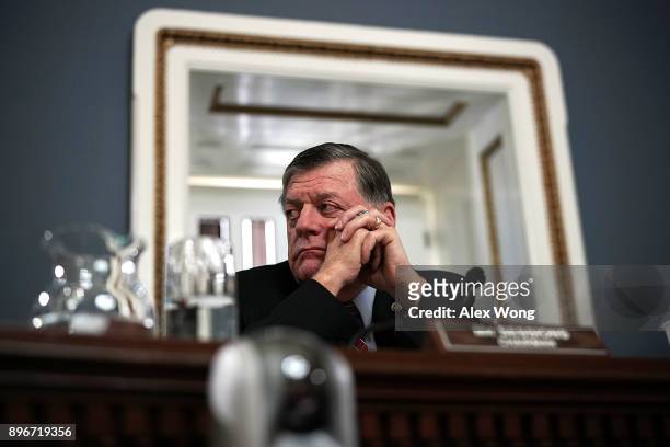 Rep. Tom Cole listens during a meeting about a bill to avert government shutdown December 21, 2017 at the Capitol in Washington, DC. House Minority...