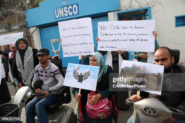 Disabled Palestinians take part in a protest against the killing of Ibraheem Abu Thuraya in front of the headquarter United Nation...