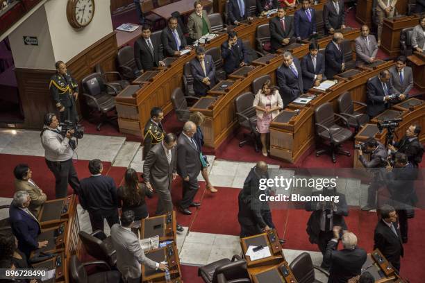 Pedro Pablo Kuczynski, Peru's president, center, arrives to testify before the National Congress in Lima, Peru, on Thursday, Dec. 21, 2017....