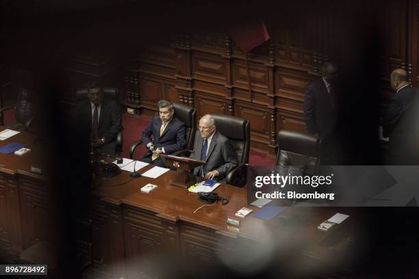 Pedro Pablo Kuczynski, Peru's president, center, sits before testifying before the National Congress in Lima, Peru, on Thursday, Dec. 21, 2017....