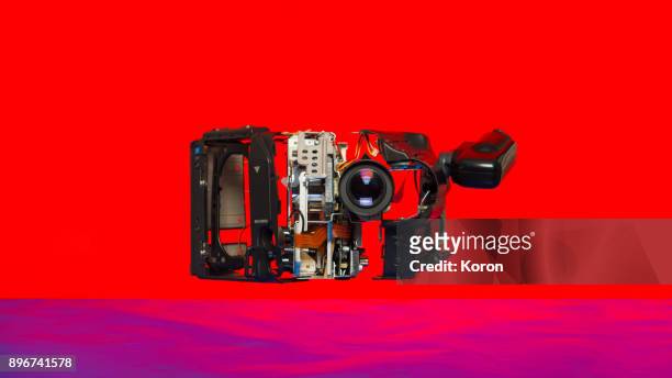 floating messy camera looking at you - messthetics stock pictures, royalty-free photos & images