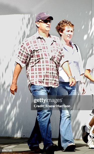 Actor Tom Hanks and his daughter Elizabeth walk down Broadway June 22, 2002 in Santa Monica, California.