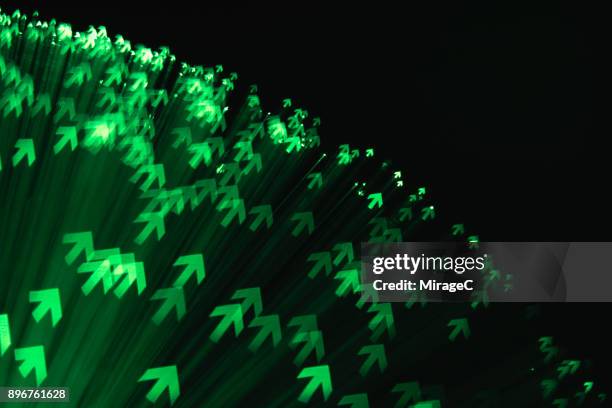 green colored up arrows - east asia stock pictures, royalty-free photos & images