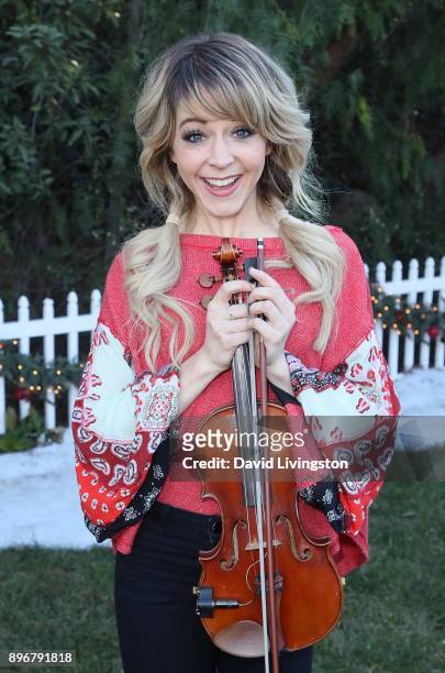 Violinist Lindsey Stirling visits Hallmark's "Home & Family" at Universal Studios Hollywood on December 21, 2017 in Universal City, California.
