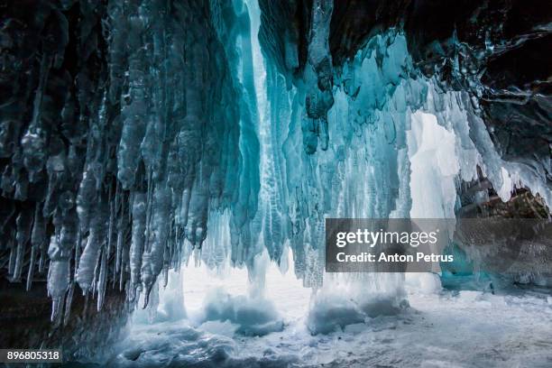 ice cave on winter baikal - crystal caves stock pictures, royalty-free photos & images