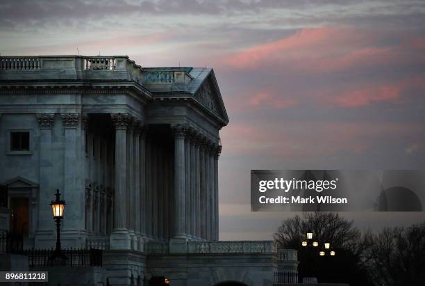 The Senate side of the U.S. Capitol is shown as Congress votes on a stopgap measure that will avoid a government shutdown one day before the...