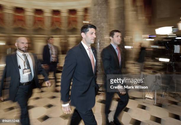 House Speaker Paul Ryan walks to a vote on a stopgap measure that will avoid a government shutdown one day before the deadline, at the U.S. Capitol...