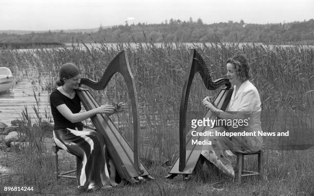 Harpists tuning in time for the O'Carolan Harp and Folk Festival, on he shores of Lough Meelagh, Keadue, Roscommon, .