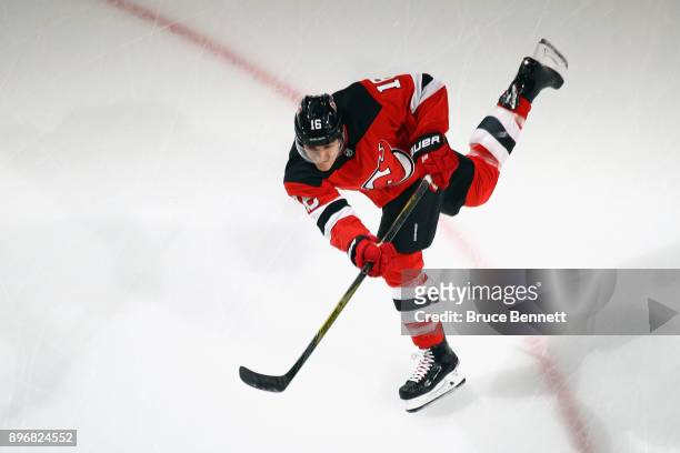 Steven Santini of the New Jersey Devils skates in warm-ups prior to the game against the New York Rangers at the Prudential Center on December 21,...