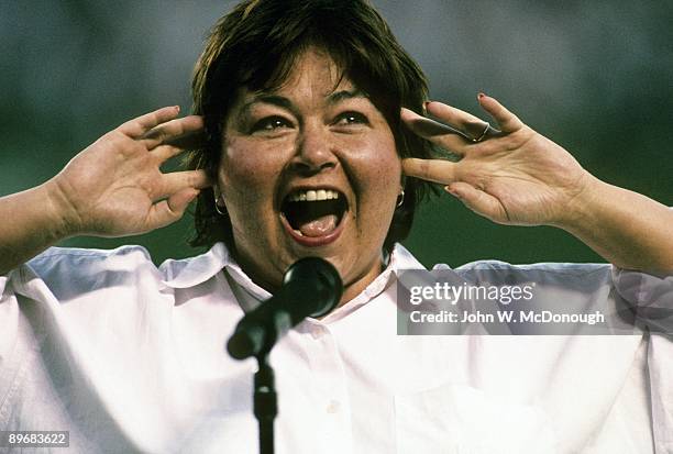 Celebrity comedian and actress Roseanne Barr singing national anthem before San Diego Padres vs Cincinnati Reds game. Barr's off-key version was...
