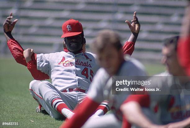 St. Louis Cardinals Bob Gibson stretching on field with teammate during spring training at Al Lang Field. St. Petersburg, FL 3/5/1970 CREDIT: Walter...