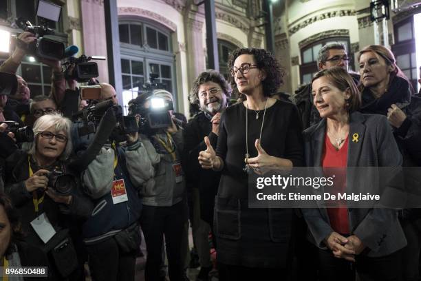 Esquerra Republicana de Catalunya' - ERC candidate Marta Rovira and Carme Forcadell , former Parliament president as they went to salute a small...