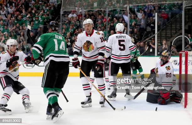 Jamie Benn of the Dallas Stars scores a goal against Corey Crawford of the Chicago Blackhawks in the first period at American Airlines Center on...