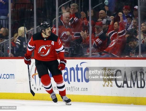 Brian Boyle of the New Jersey Devils celebrates his shootout game winning goal against the New York Rangers at the Prudential Center on December 21,...