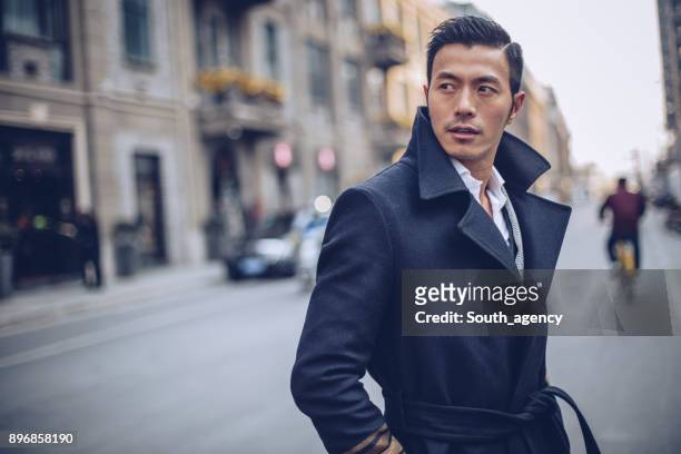 handsome man downtown - handsome people stock pictures, royalty-free photos & images