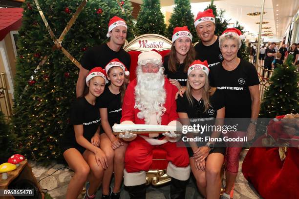 New Zealand athletes visit Santa at Westfield Albany Mall with the Queens Baton during the Queens Baton Commonwealth Games Relay on December 22, 2017...