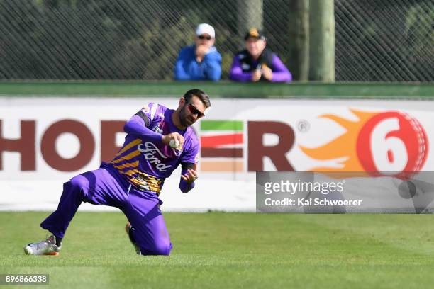 Andrew Ellis of Canterbury takes a catch to dismiss Tom Bruce of the Central Stags during the Super Smash match between the Canterbury Kings and the...
