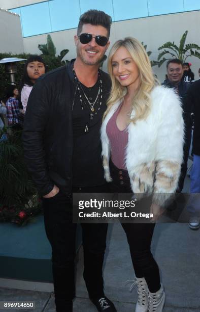 Singer Robin Thicke and actress Camille Anderson attend A Children's Miracle Holiday Sponsored by Amity Medical Group and Vitamin Patch Club in...