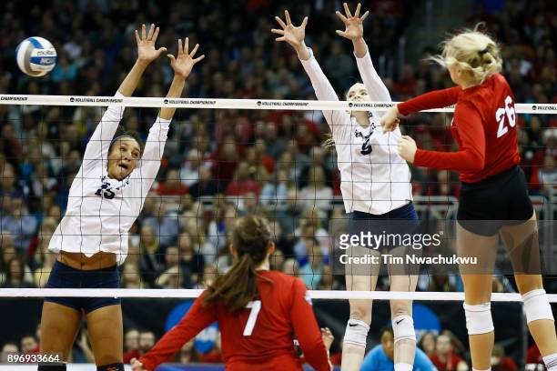 Haleigh Washington and Ali Frantti of Penn State University reach for the ball during the Division I Women's Volleyball Semifinals held at Sprint...