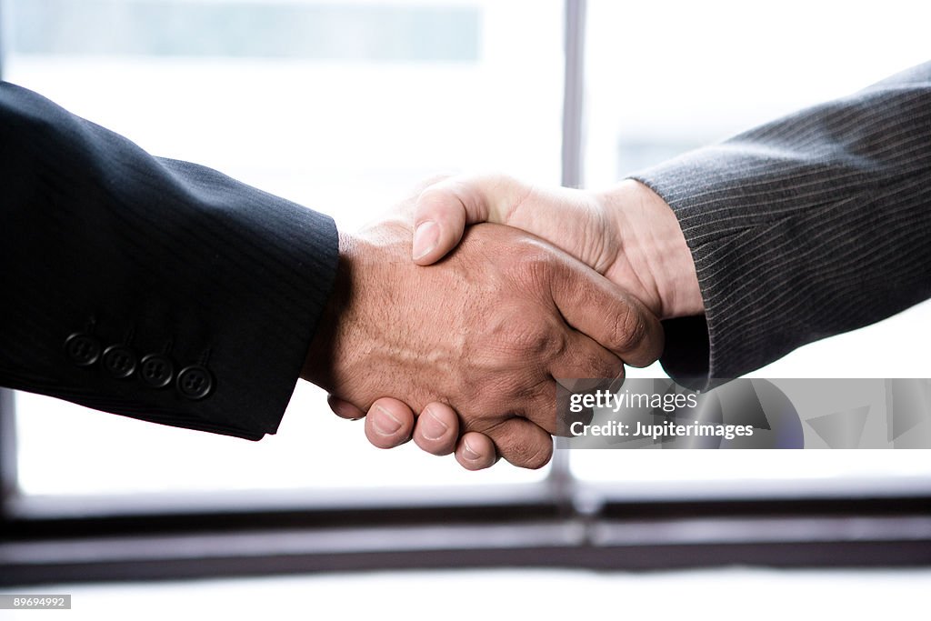 Businessmen handshake