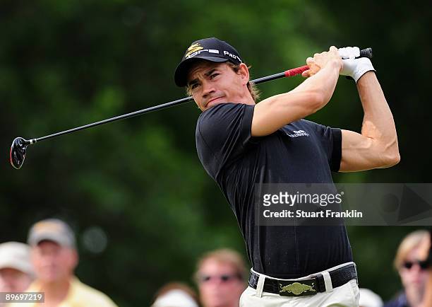 Camilo Villegas of Columbia plays his tee shot on the 14th hole during the second round of the World Golf Championship Bridgestone Invitational on...