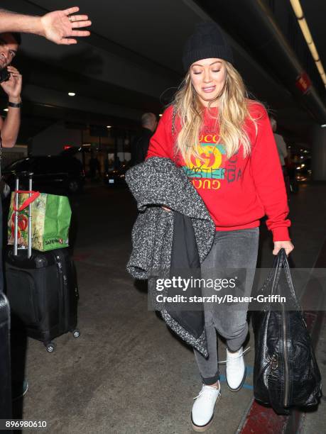 Hilary Duff is seen at Los Angeles International Airport on December 21, 2017 in Los Angeles, California.