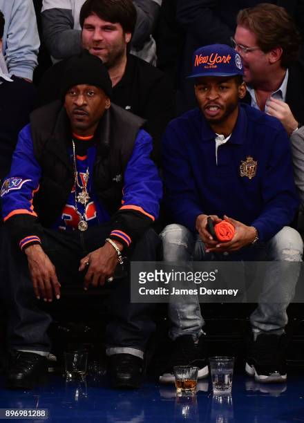 Rakim and guest attend the New York Knicks Vs Boston Celtics game at Madison Square Garden on December 21, 2017 in New York City.