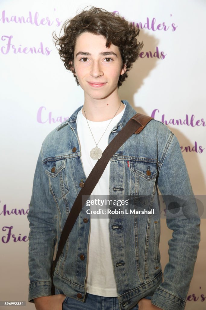 Joshua Carlon attends Chandler's Friends Toy Drive and Wrapping Party