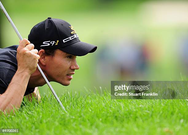 Camilo Villegas of Columbia lines up his putt on the 13th hole during the second round of the World Golf Championship Bridgestone Invitational on...