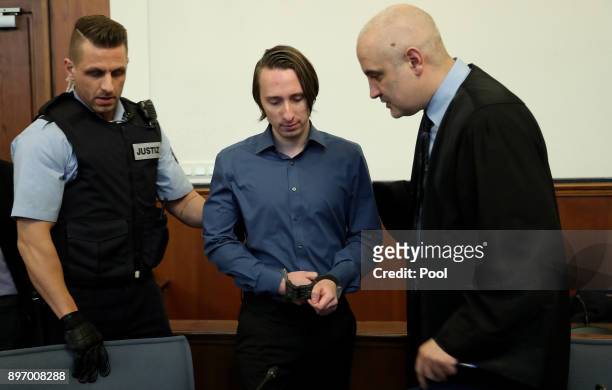 Defendant Sergej W. Is escorted by a judicial officer into the district court during the trial for the bombing of the Borussia Dortmund bus on...