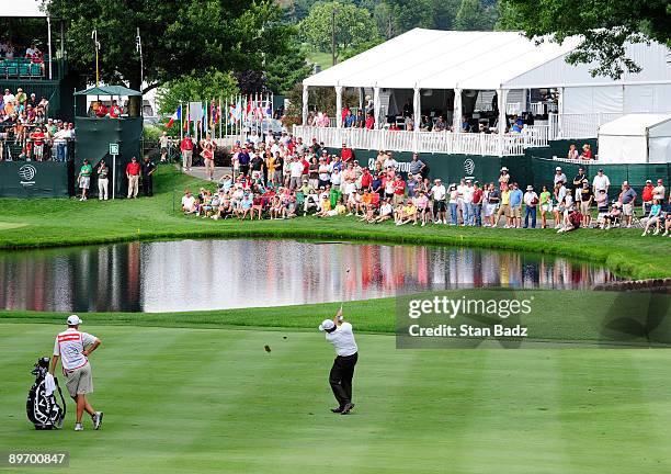 Phil Mickelson hits to the 16th green during the second round of the World Golf Championships-Bridgestone Invitational held at Firestone Country Club...