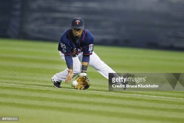 Alexi Casilla of the Minnesota Twins fields a ball against the Los Angeles Angels on August 2, 2009 at the Metrodome in Minneapolis, Minnesota. The...