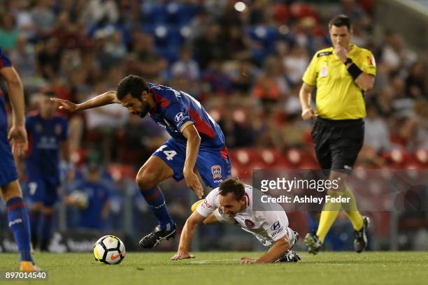 Brendon Santalab of Western Sydney contests the ball against Nikolai Topor-Stanley of the Jets during the round 12 A-League match between the...