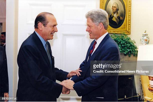 French politician Mayor of Paris Jacques Chirac and American politician US President Bill Clinton shake hands in the White House's Oval Office,...