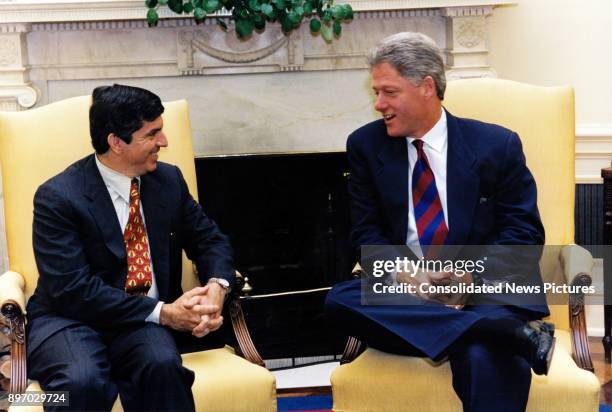 Secretary General of the Organization of American State Cesar Gaviria and US President Bill Clinton take together in the Oval office of the White...