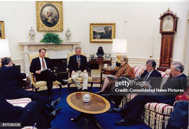 American politician US President Bill Clinton hosts a cabinet meeting in the White House's Oval Office, Washington DC, May 11, 1998. Pictured are,...