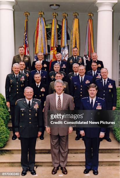 President Bill Clinton poses with the United States Armed Forces Service Chiefs and the Commanders-in-Chief in the White House's Rose Garden,...