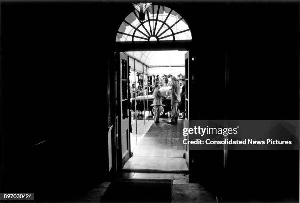 At the Diplomatic Entrance to the White House, Japanese Prime Minister Kiichi Miyazawa shakes hands with US President Bill Clinton at the conclusion...