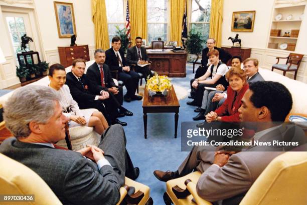 American politician US President Bill Clinton meets with representatives from gay and lesbian organizations in the White House's Oval Office,...