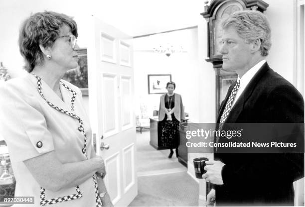 American Attorney General Janet Reno speaks with US President Bill Clinton in the White House's Oval Office, Washington DC, April 15, 1993.