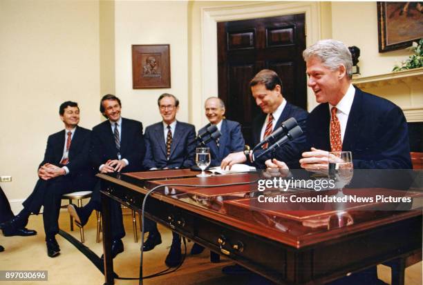 American politician US President Bill Clinton delivers his weekly, live radio address from the Roosevelt Room of the White House, Washington DC,...