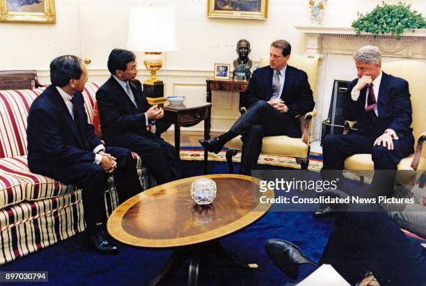 View of, from left, Thai Ambassador to the United States Nitya Pibulsonggram, Thai Finance Minister Tarrin Nimmanahaeminda, US Vice President Al...