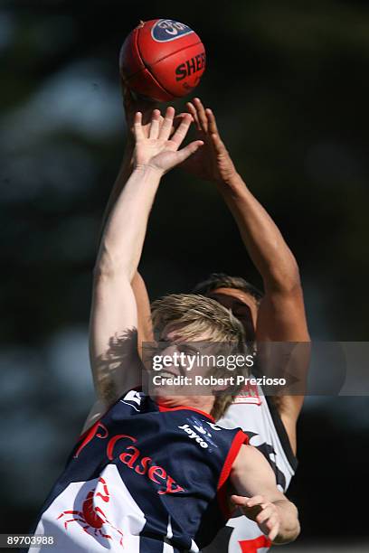 Tim Smith of the Scorpions attempts to mark during the round 17 VFL match between the Casey Scorpions and North Ballarat Roosters at Casey Fields on...