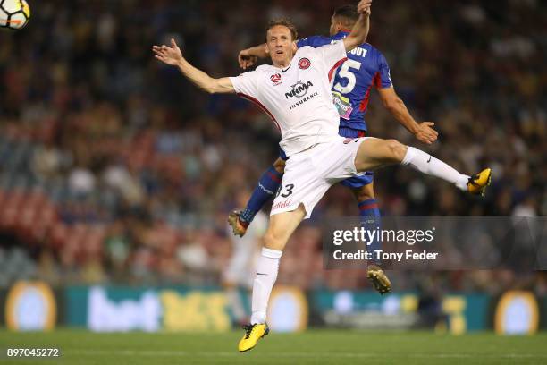 Michael Thwaite of the Wanderers contests the ball during the round 12 A-League match between the Newcastle Jets and the Western Sydney Wanderers at...