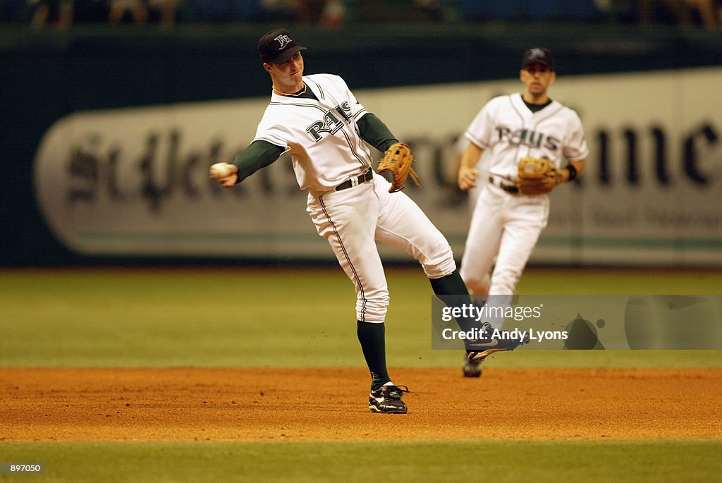 Devil Rays Frank Third baseman Jared Sandberg of the Tampa Bay Devil Rays throws to ...