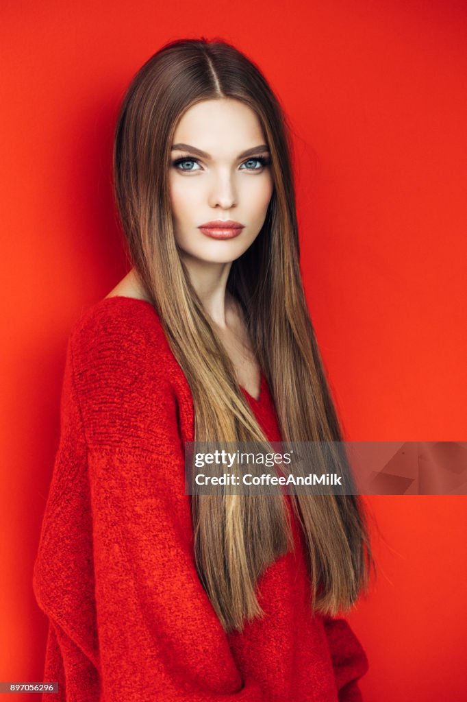 Young beautiful model with long straight hair