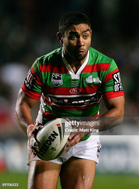 Nathan Merritt of the Rabbitohs runs with the ball during the round 22 NRL match between the Manly Warringah Sea Eagles and the South Sydney...