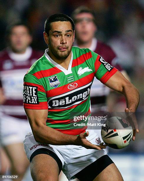 John Sutton of the Rabbitohs passes the ball during the round 22 NRL match between the Manly Warringah Sea Eagles and the South Sydney Rabbitohs at...