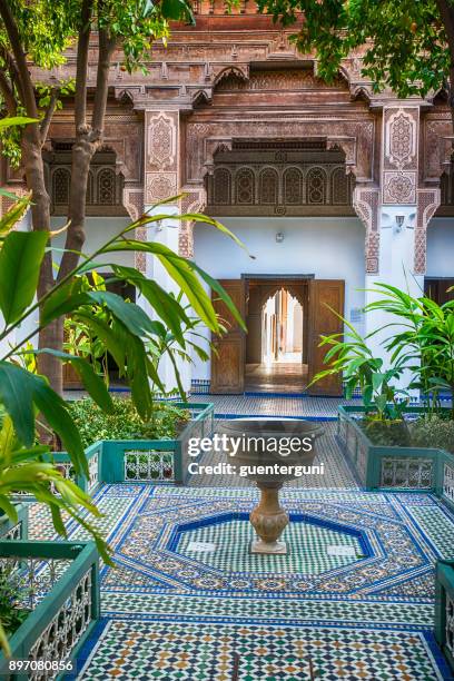 inner courtyard public bahia palace, marrakech - morrocco stock pictures, royalty-free photos & images