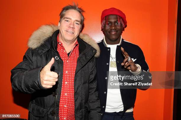 Lil Yachty and Andy Hilfiger attend La La Anthony Hosts "Winter Wonderland" Holiday Charity Event on December 21, 2017 in New York City.